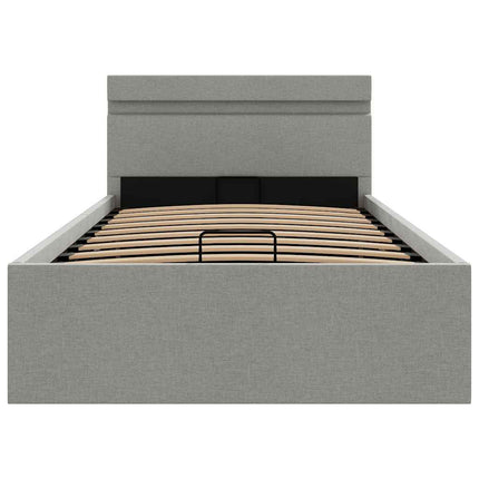 hydraulisk opbevaringsseng med LED 90x200 cm stof lysegrå