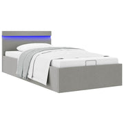 hydraulisk opbevaringsseng med LED 100x200 cm stof lysegrå