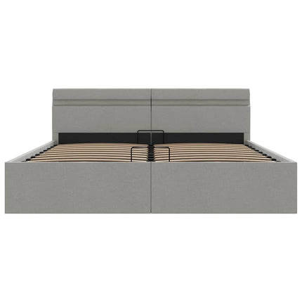hydraulisk opbevaringsseng med LED 160x200 cm stof lysegrå