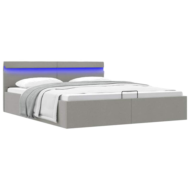hydraulisk opbevaringsseng med LED 180x200 cm stof lysegrå