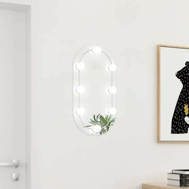 spejl med LED-lamper 60x30 cm oval glas