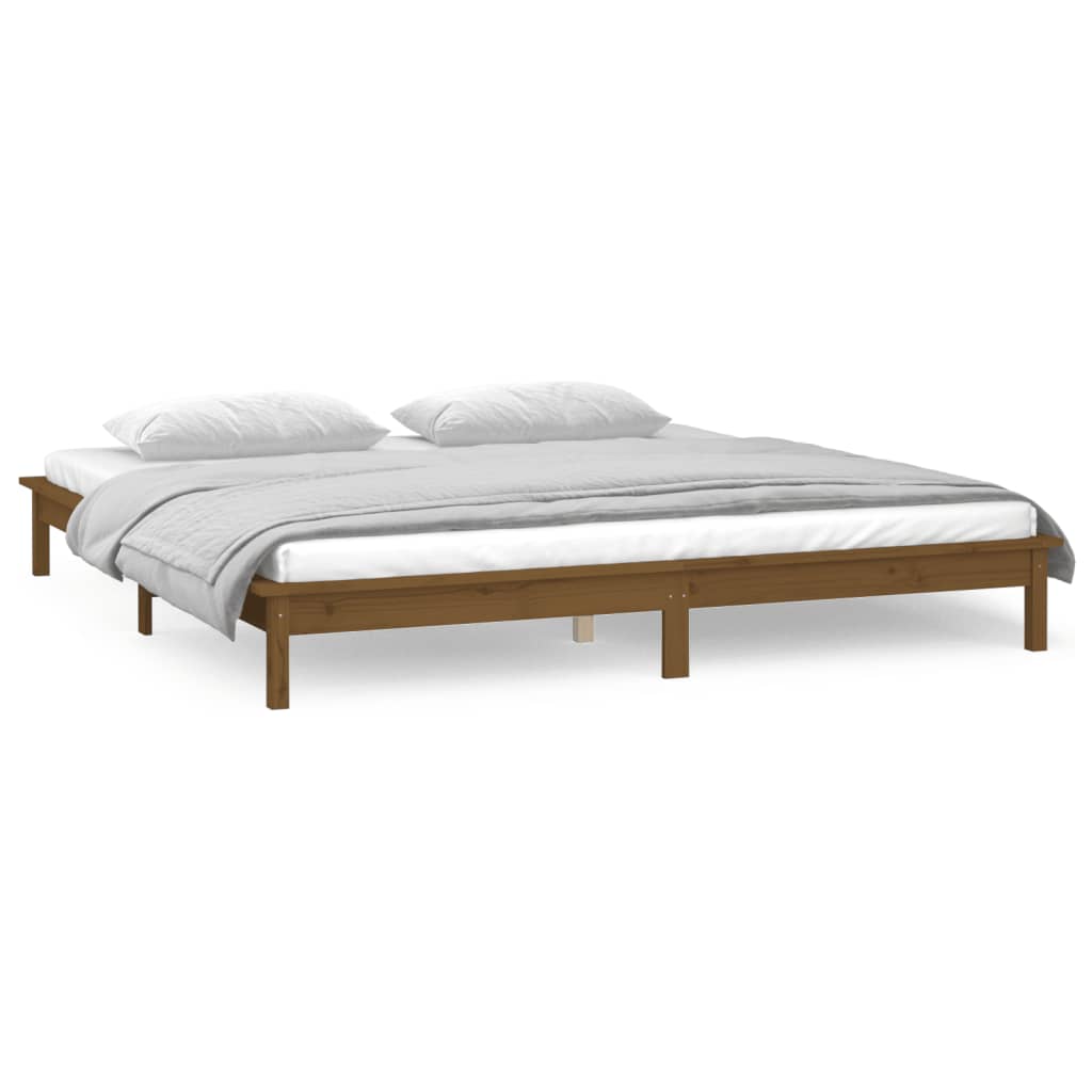 sengeramme med LED-lys 140x200 cm massivt træ gyldenbrun
