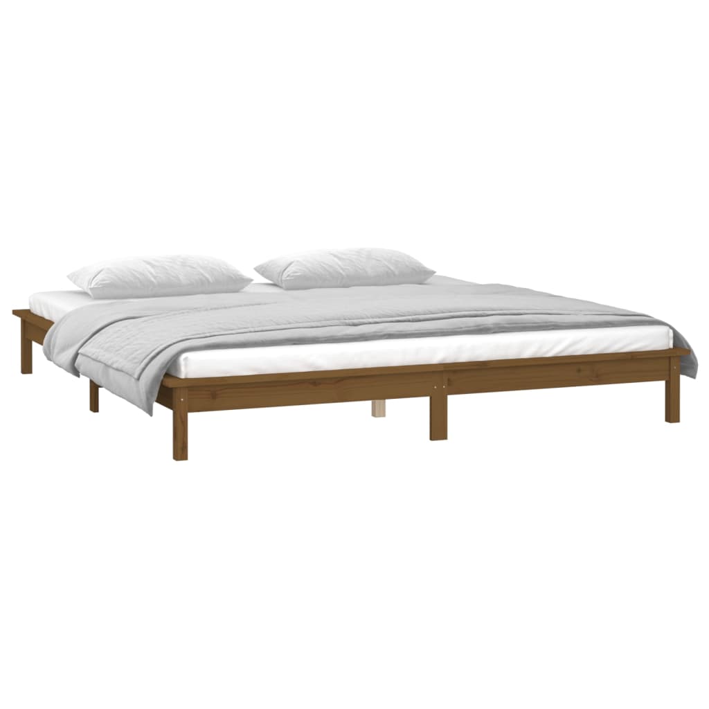 sengeramme med LED-lys 120x190 cm massivt træ gyldenbrun