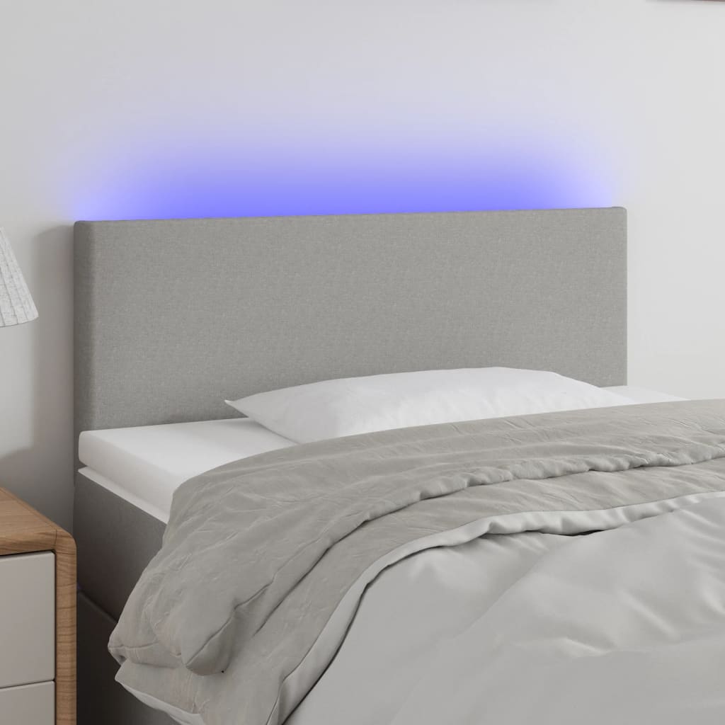 sengegavl med LED-lys 100x5x78/88 cm stof lysegrå