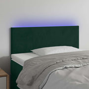 sengegavl med LED-lys 90x5x78/88 cm fløjl mørkegrøn