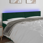 sengegavl med LED-lys 180x5x78/88 cm fløjl mørkegrøn