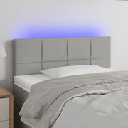 sengegavl med LED-lys 90x5x78/88 cm stof lysegrå