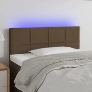sengegavl med LED-lys 90x5x78/88 cm stof mørkebrun