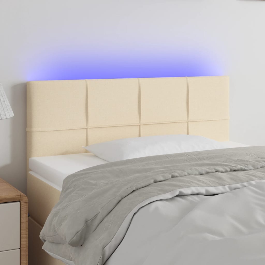 sengegavl med LED-lys 100x5x78/88 cm stof cremefarvet