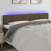 sengegavl med LED-lys 180x5x78/88 cm stof gråbrun