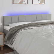 sengegavl med LED-lys 200x5x78/88 cm stof lysegrå