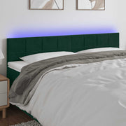 sengegavl med LED-lys 200x5x78/88 cm fløjl mørkegrøn