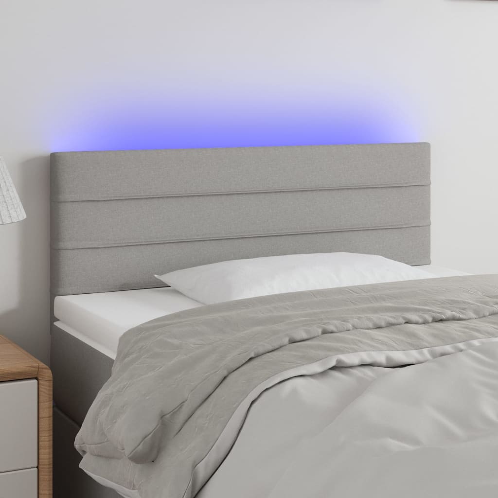 sengegavl med LED-lys 90x5x78/88 cm stof lysegrå
