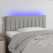 sengegavl med LED-lys 90x5x78/88 cm stof lysegrå