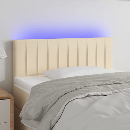 sengegavl med LED-lys 90x5x78/88 cm stof cremefarvet
