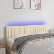 sengegavl med LED-lys 144x5x78/88 cm stof cremefarvet