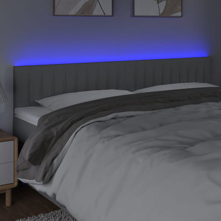 sengegavl med LED-lys 180x5x78/88 cm stof lysegrå