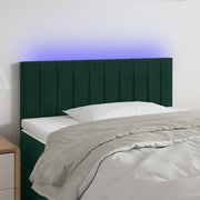sengegavl med LED-lys 100x5x78/88 cm fløjl mørkegrøn
