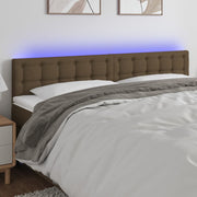 sengegavl med LED-lys 200x5x78/88 cm stof mørkebrun