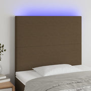 sengegavl med LED-lys 80x5x118/128 cm stof mørkebrun
