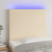 sengegavl med LED-lys 80x5x118/128 cm stof cremefarvet