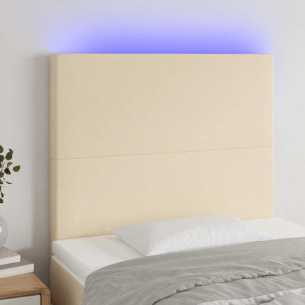 sengegavl med LED-lys 80x5x118/128 cm stof cremefarvet