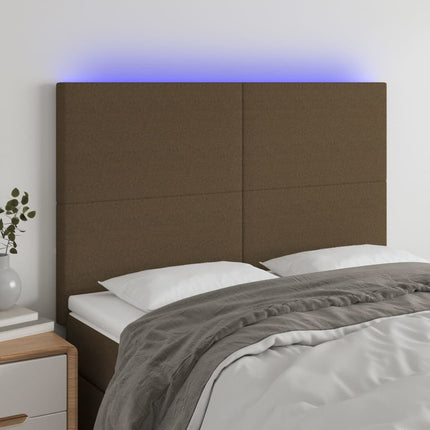 sengegavl med LED-lys 144x5x118/128 cm stof mørkebrun
