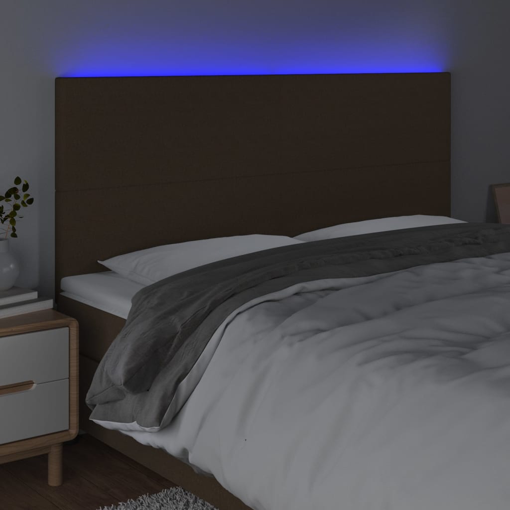 sengegavl med LED-lys 160x5x118/128 cm stof mørkebrun