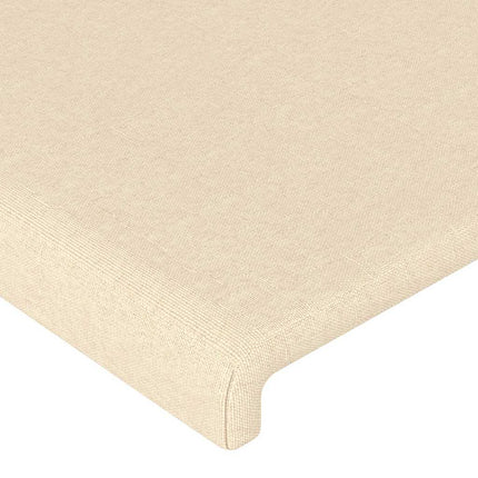 sengegavl med LED-lys 160x5x118/128 cm stof cremefarvet