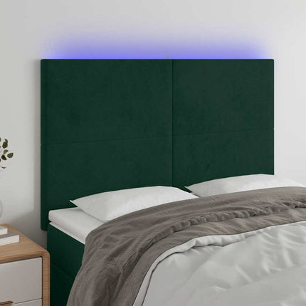 sengegavl med LED-lys 144x5x118/128 cm fløjl mørkegrøn