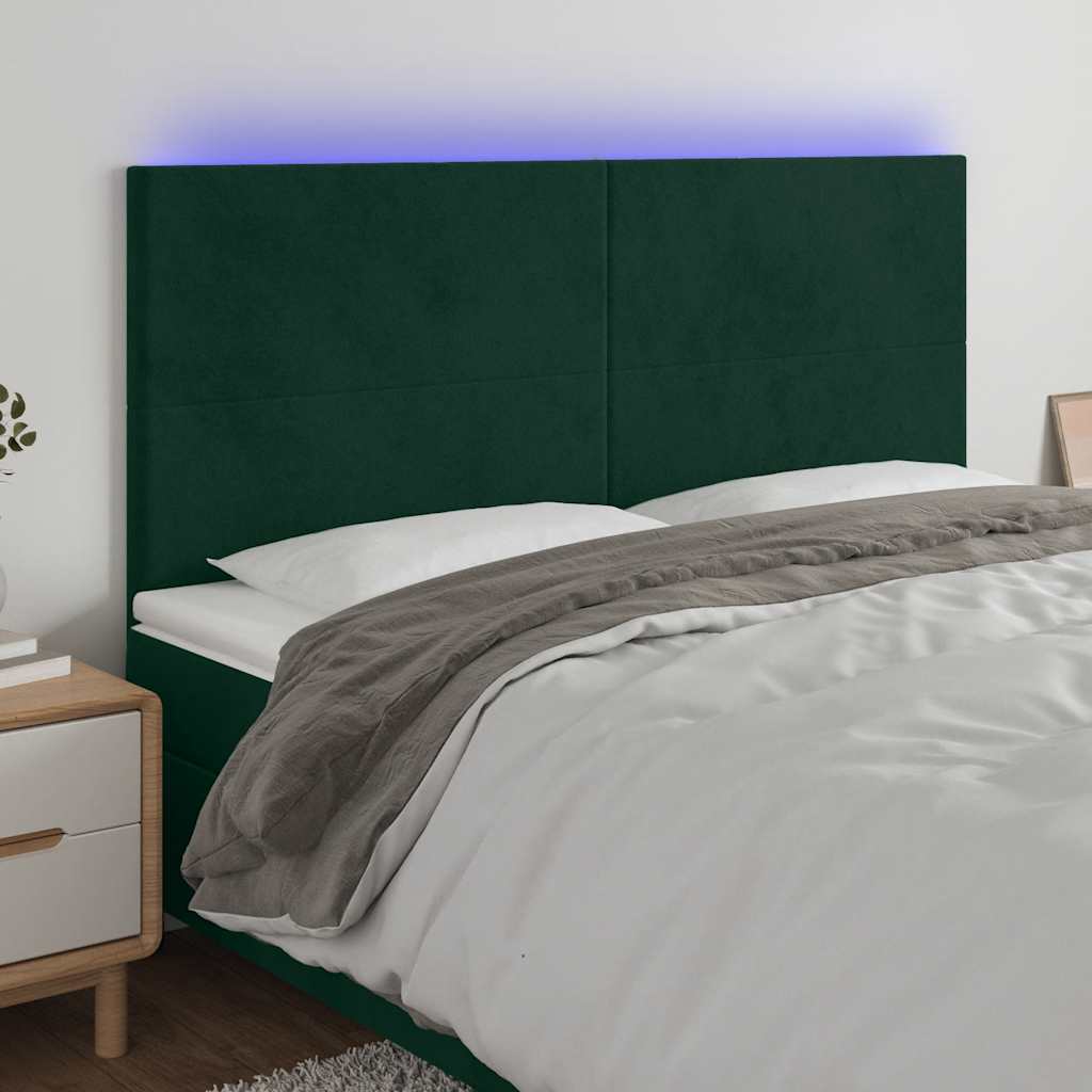 sengegavl med LED-lys 160x5x118/128 cm fløjl mørkegrøn