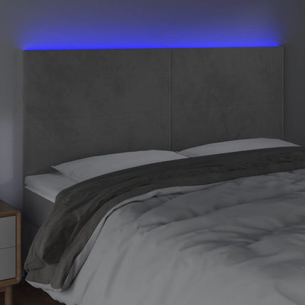 sengegavl med LED-lys 180x5x118/128 cm fløjl lysegrå