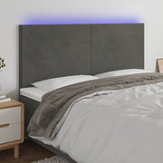 sengegavl med LED-lys 180x5x118/128 cm fløjl mørkegrå