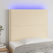 sengegavl med LED-lys 90x5x118/128 cm stof cremefarvet