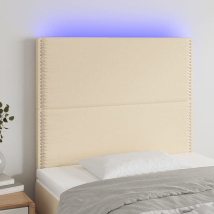 sengegavl med LED-lys 90x5x118/128 cm stof cremefarvet