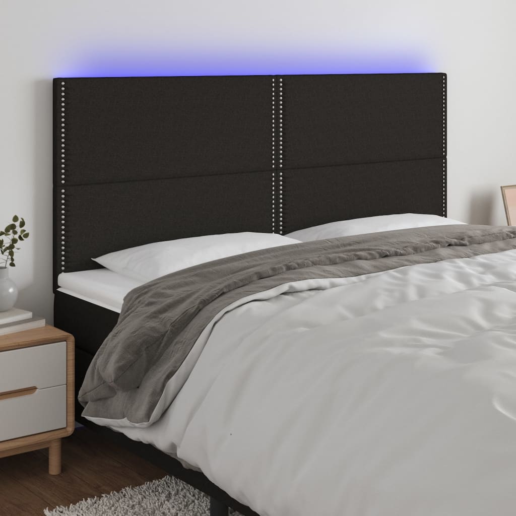 sengegavl med LED-lys 180x5x118/128 cm stof sort