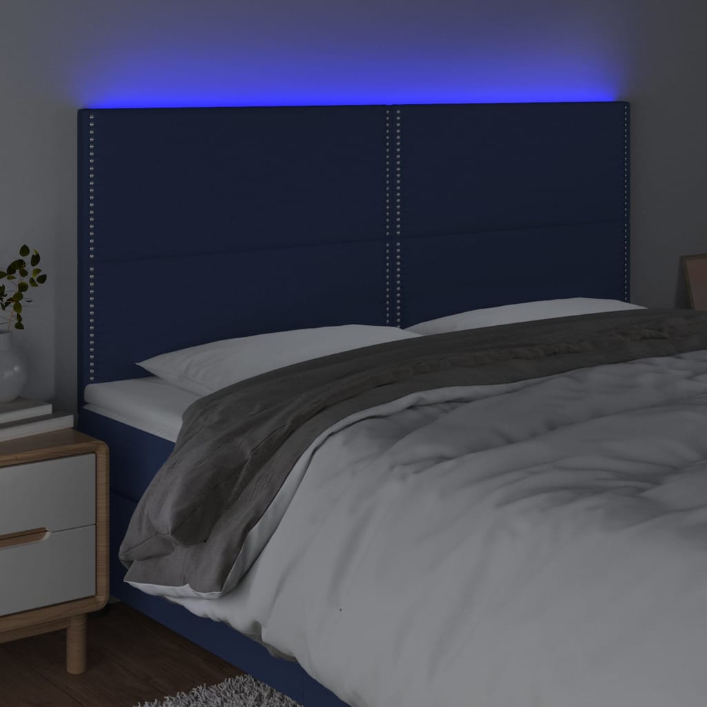 sengegavl med LED-lys 200x5x118/128 cm stof blå