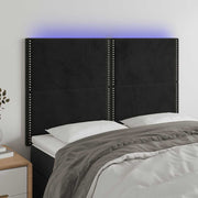 sengegavl med LED-lys 144x5x118/128 cm fløjl sort