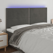 sengegavl med LED-lys 160x5x118/128 cm fløjl mørkegrå