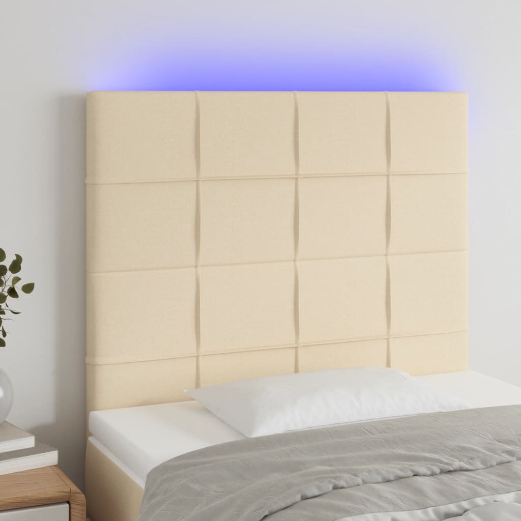sengegavl med LED-lys 90x5x118/128 cm stof cremefarvet