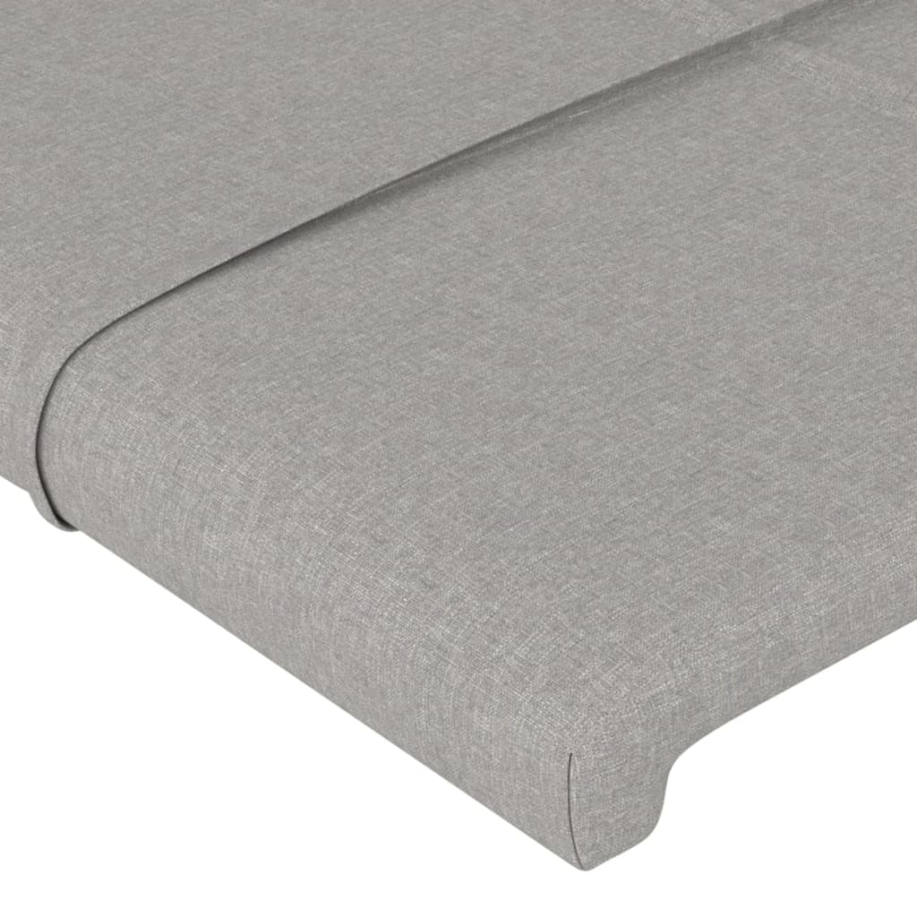 sengegavl med LED-lys 144x5x118/128 cm stof lysegrå