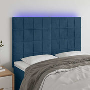 sengegavl med LED-lys 144x5x118/128 cm fløjl mørkeblå