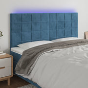 sengegavl med LED-lys 200x5x118/128 cm fløjl mørkeblå