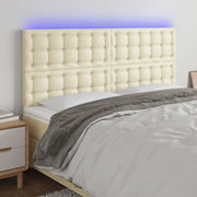 sengegavl med LED-lys 160x5x118/128 cm kunstlæder cremefarvet