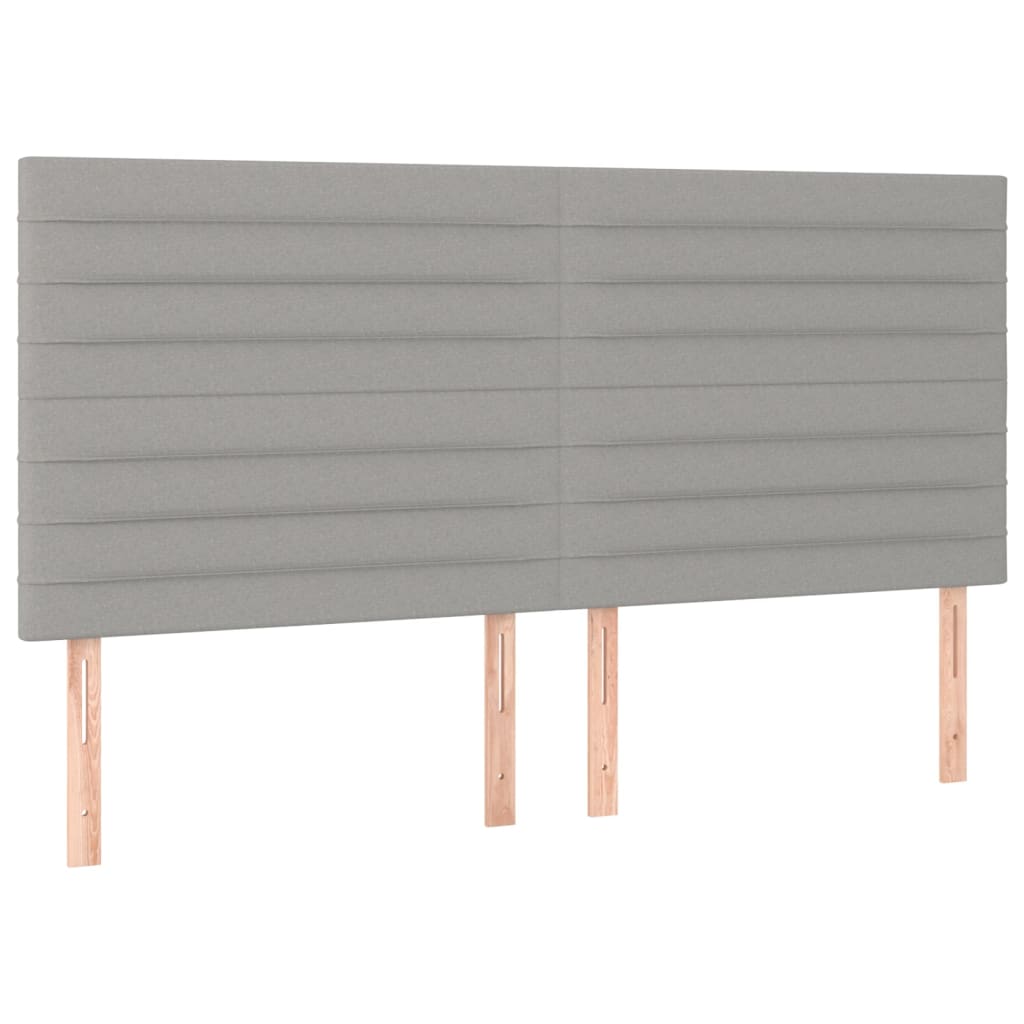 sengegavl med LED-lys 160x5x118/128 cm stof lysegrå