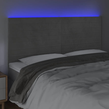 sengegavl med LED-lys 160x5x118/128 cm fløjl lysegrå