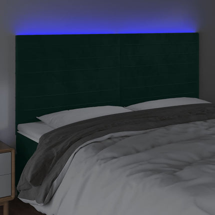 sengegavl med LED-lys 160x5x118/128 cm fløjl mørkegrøn