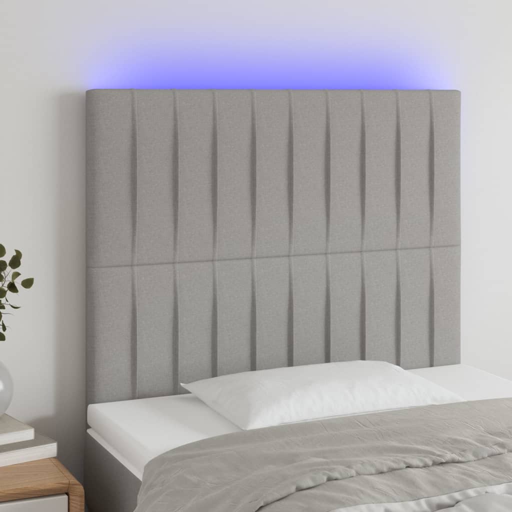sengegavl med LED-lys 80x5x118/128 cm stof lysegrå