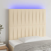 sengegavl med LED-lys 80x5x118/128 cm stof cremefarvet