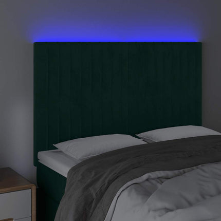 sengegavl med LED-lys 144x5x118/128 cm fløjl mørkegrøn